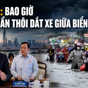 TP.HCM: Bao giờ người dân thôi dắt xe giữa biển nước